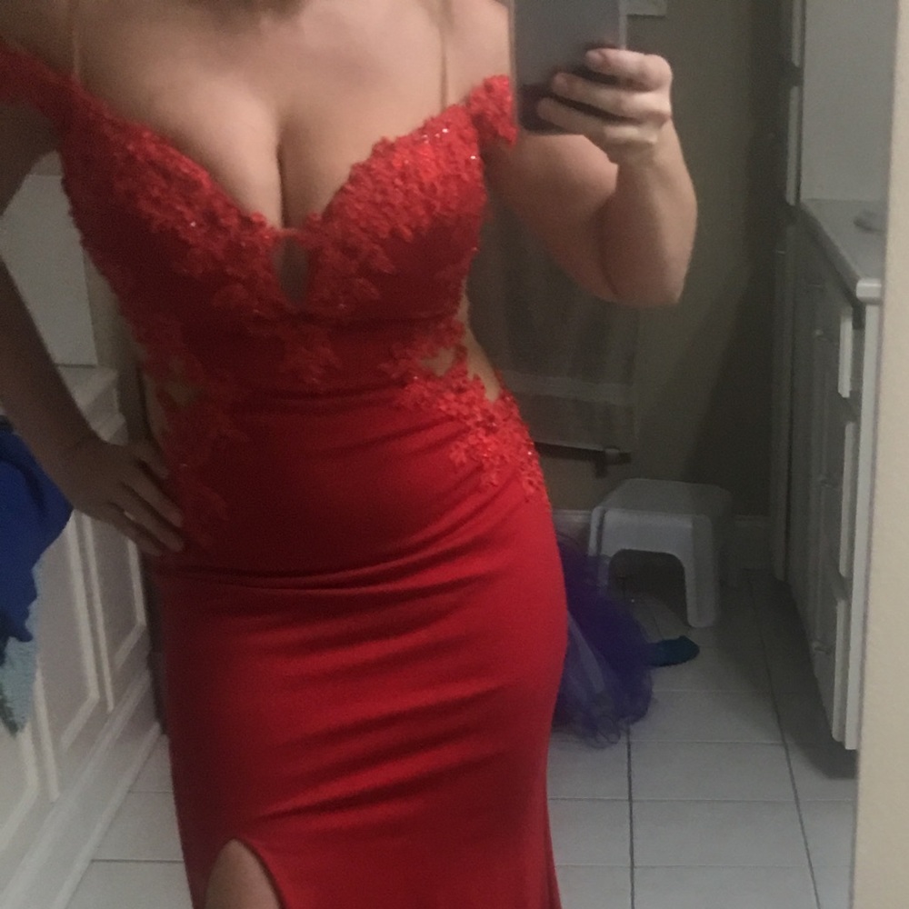 Red and sheer ball gown with side slit